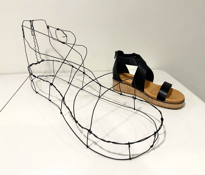 Wire shaped as a shoe
