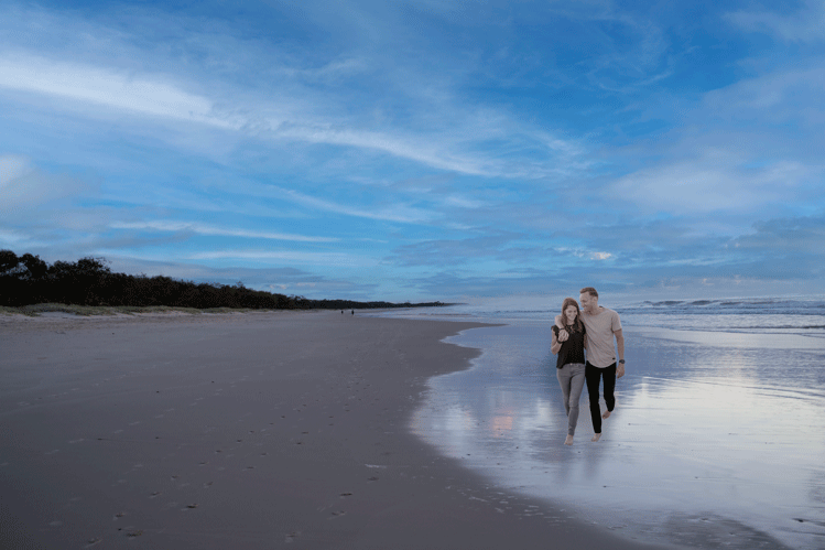 Couple walking on beach