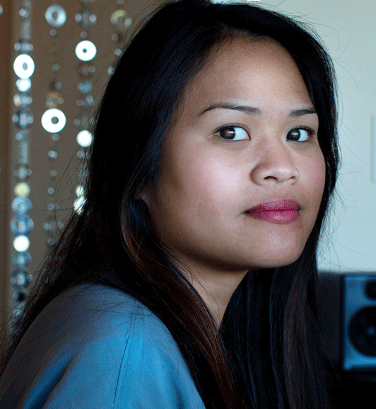 Side profile view of girl with fixed red eye